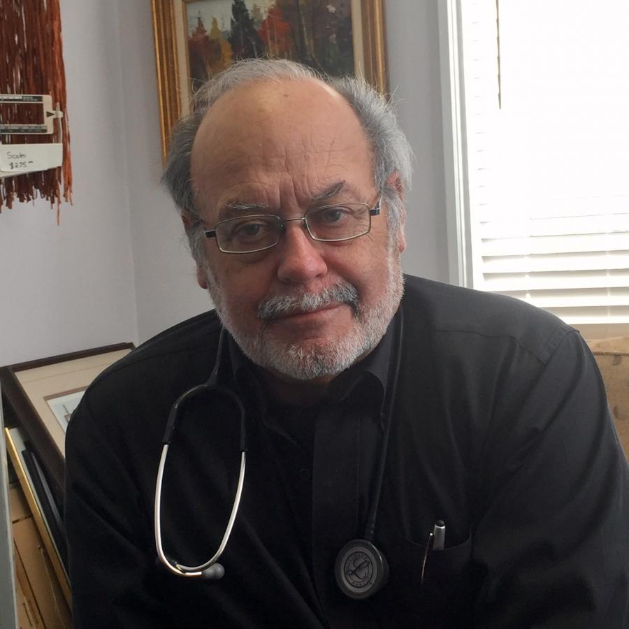Dr. Paul Caulford runs a clinic in for refugees without health insurance.