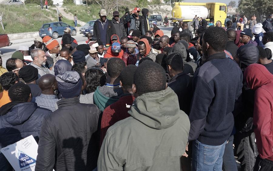 A group of African migrants, including English-speaking Cameroonians, protest against the deportations of asylum-seekers on the Greek island of Lesbos.