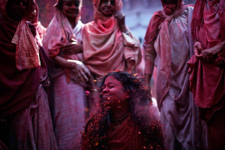 Women taking part in the Holi celebrations Uttar Pradesh. 