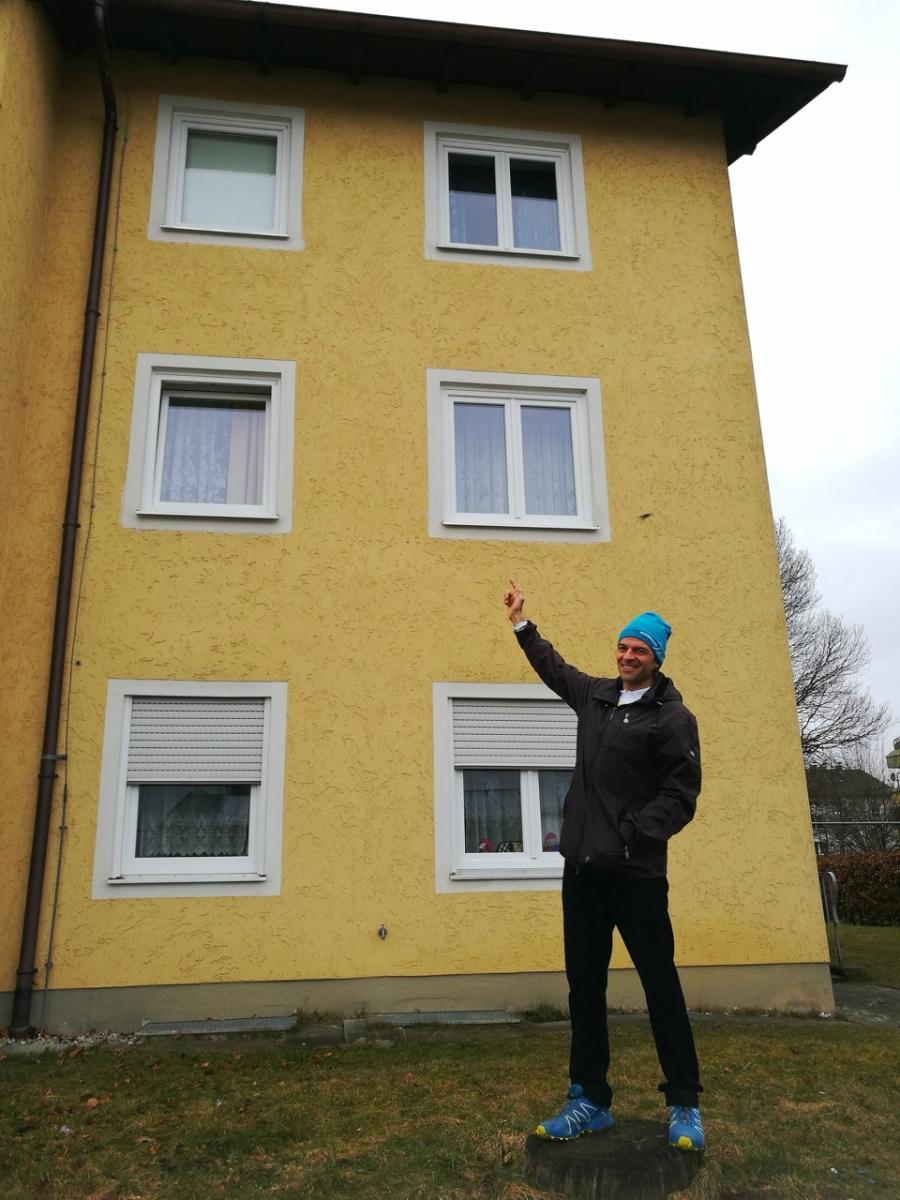 Oliver Koglot stands in front of his childhood home in Traunreut. Koglot helped organize two anti-immigrant rallies in the city with help from the far-right Alternative for Deutschland party. He arrived to Traunreut in the 80s with his family as  German i