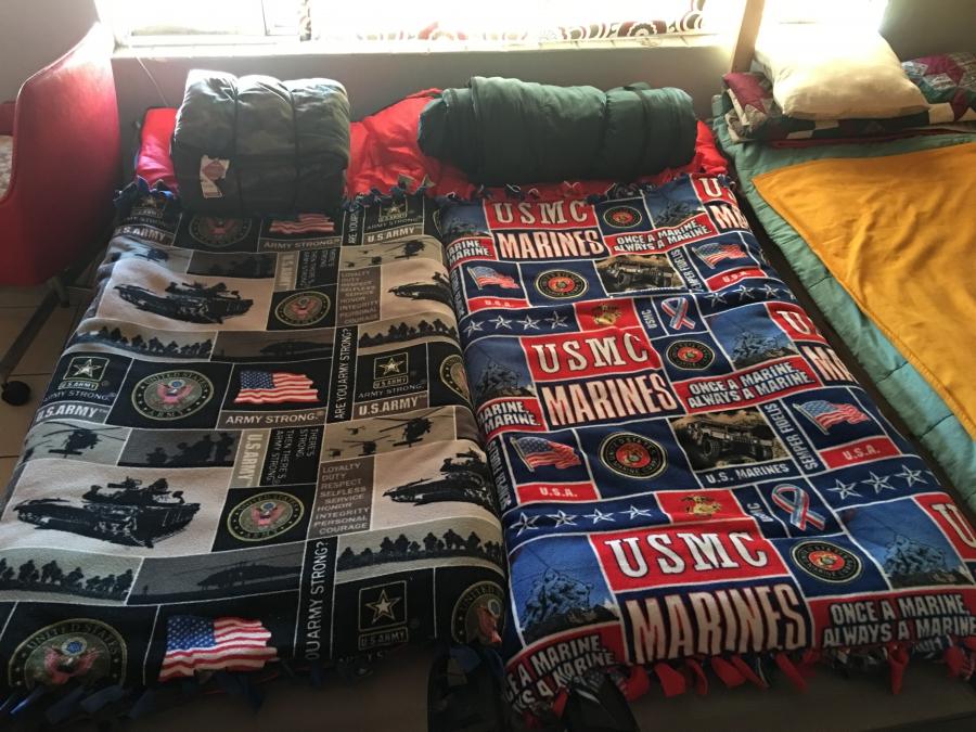 Beds at The Bunker have military motif blankets