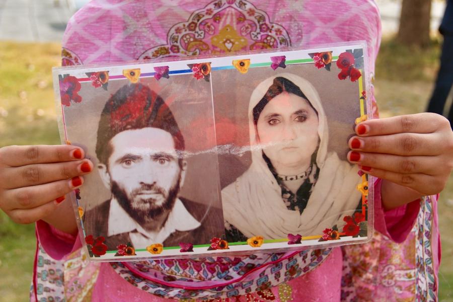 Nabila ur Rehman holds a photo of her grandfather and her grandmother