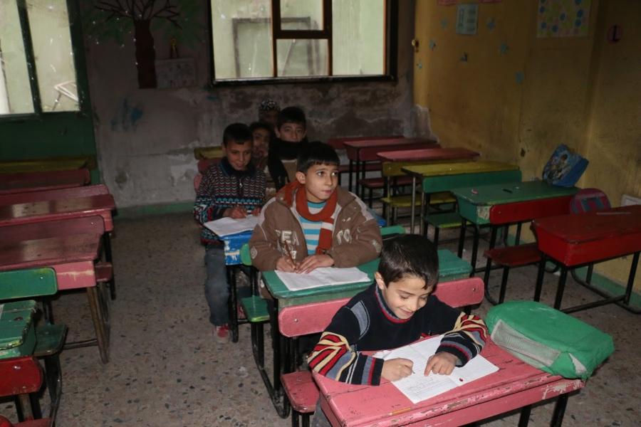 Children taking classes with Herras in Ghouta.