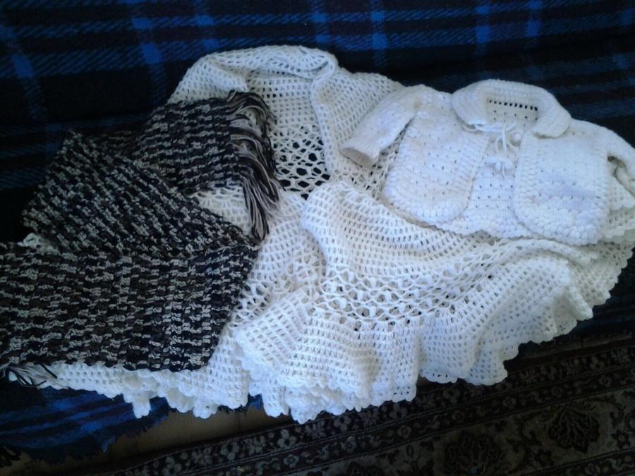 A crochet scarf and jacket by Hiba Bekai