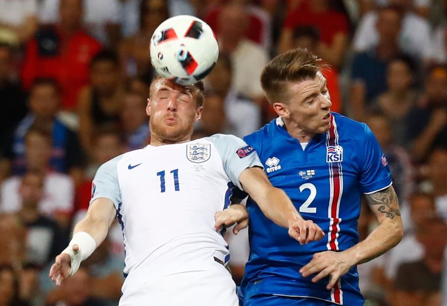 England's Jamie Vardy goes for the ball against Iceland's Birkir Saevarsson.