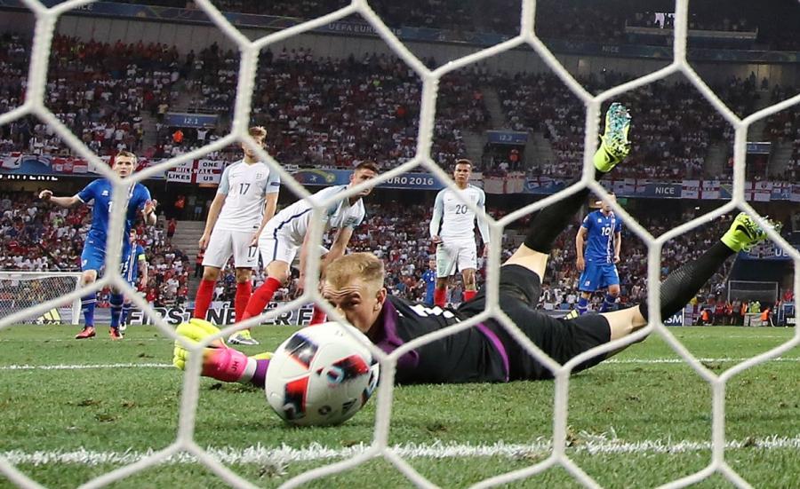 England's Joe Hart looks on as Iceland's Kolbeinn Sigthorsson scores their second goal.