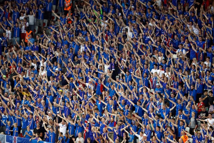 Iceland fans cheer.