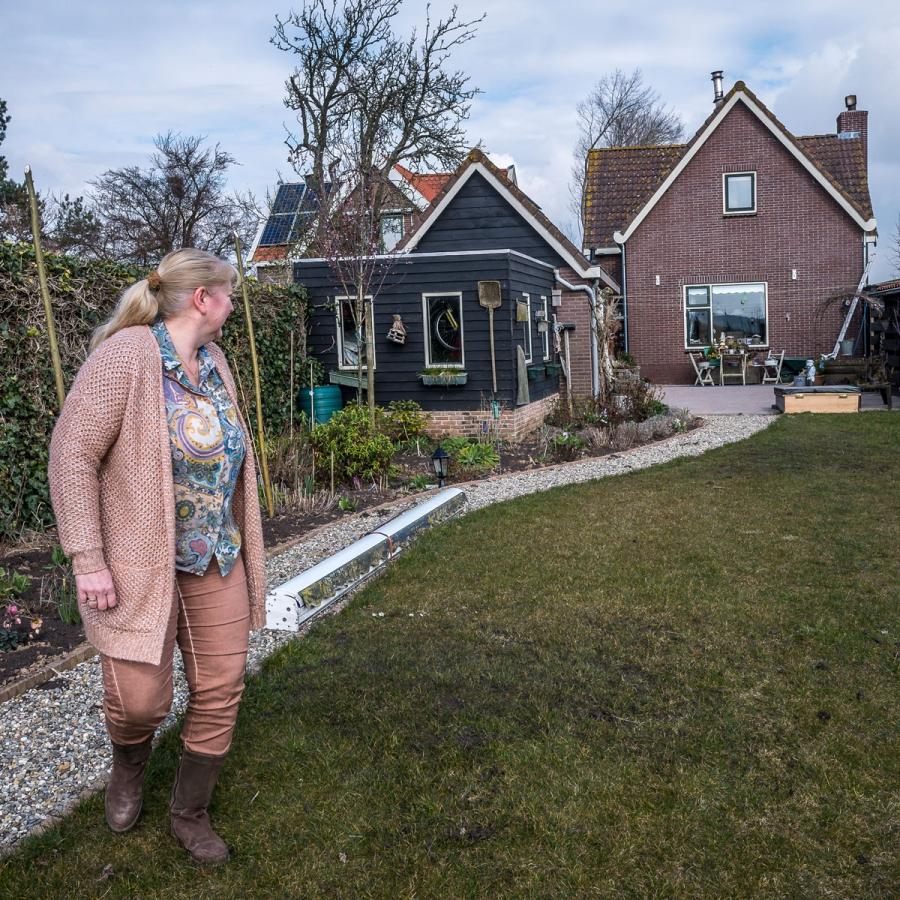 Anneke van Lelieveld's house sits atop a dike near a "room for the river" project in Noordwaard, the Netherlands. She understands the need for a new approach to managing water in this new era of climate change, but misses the neighbors that the project di