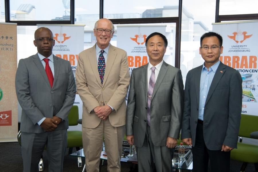 David Monyae, far left, codirector of the Confucius Institute at the University of Johannesburg, and John Stremlau, second from left, visiting professor of international relations at Witwatersrand University