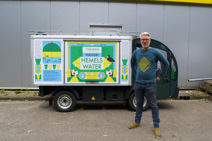 Joris Hoebe with his company's electric van. Hoebe turns 1,000 liters of rain water a week into beer, with big plans to expand.