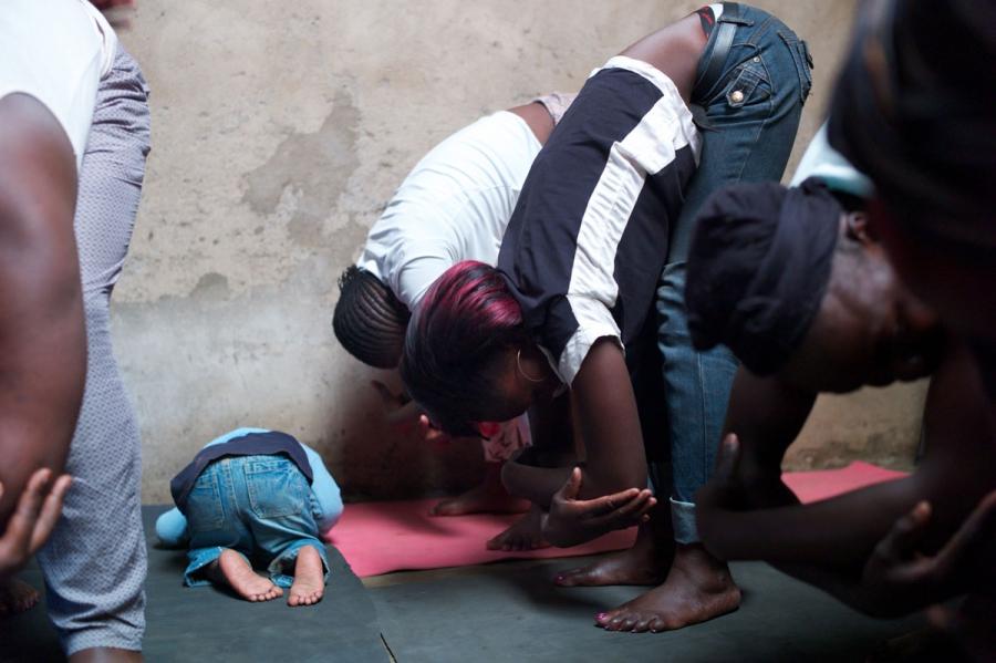 Students get the hang of the rag-doll pose in a class for girls and young mothers in Kariobangi.