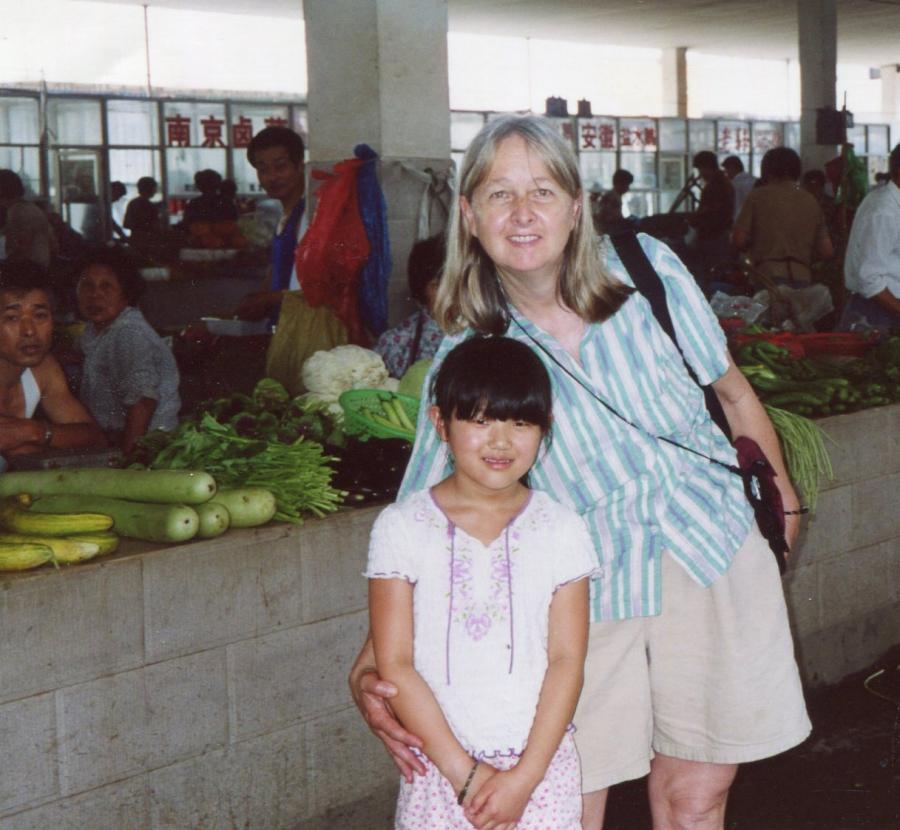 Maya and Melissa Ludtke in a market in Xiaxi, Jiangsu province in 2004, where Maya was born before Melissa adopted her.