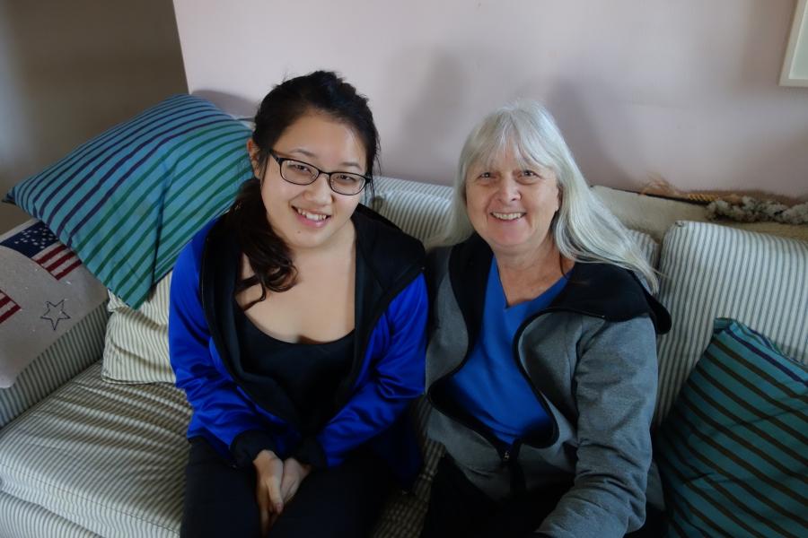 Maya (left) and her adopted mother Melissa Ludtke, in their Cambridge, MA living room.
