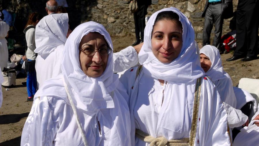 Noor Roomi (left) and her daughter Rand Nashi, both born in Iraq, were not going to miss an opportunity to be baptized by the Mandaean high priest Sheikh Salah, who recently visited the city of Worcester to preside over a communal baptism with several doz