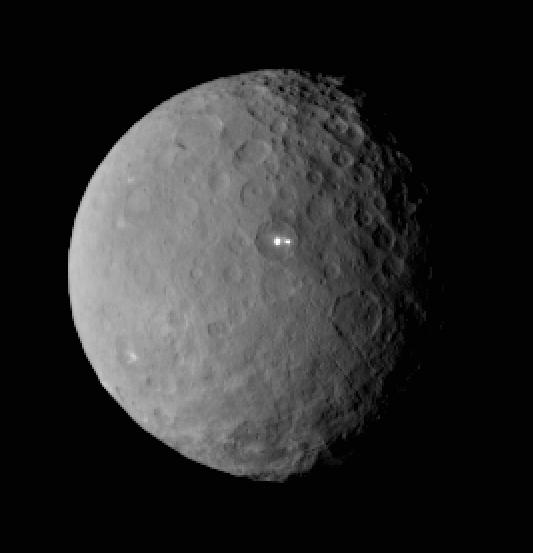 An image taken by Dawn on Feb. 19 of two bright spots on Ceres.