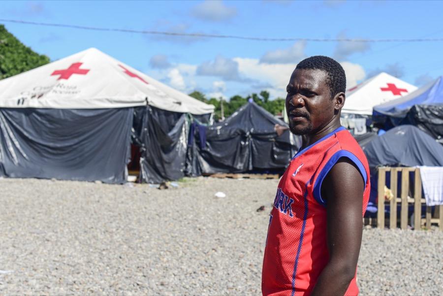 A migrant stands in a makeshift camp set up by the Red Cross in Paso Canoas, near Costa Rica's border with Panama.