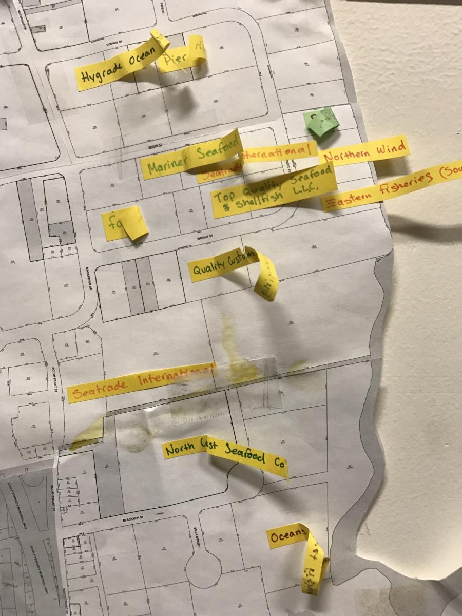 A map of New Bedford on the wall at CCT's office shows worksites where employees — documented and not — have organized with the help of the group. Some workers' committees have active lawsuits against their employers.