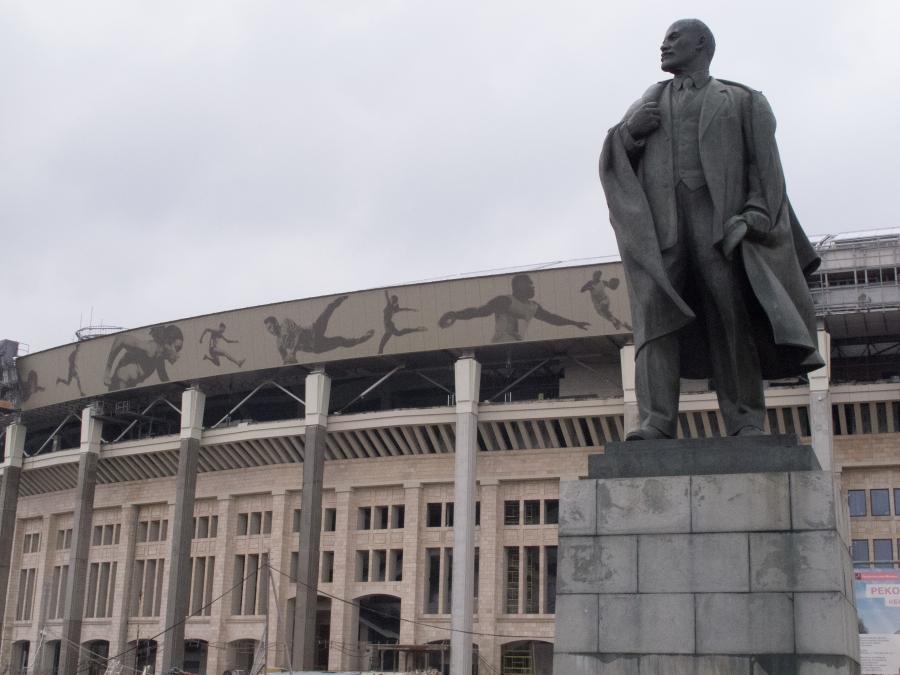 A Soviet-era statue of Vladimir Lenin stands outside Luzhniki Stadium in Moscow. Russia will host the 2018 World Cup in 11 host cities that need new stadiums or extensive renovations on older venues like Luzhniki Stadium.