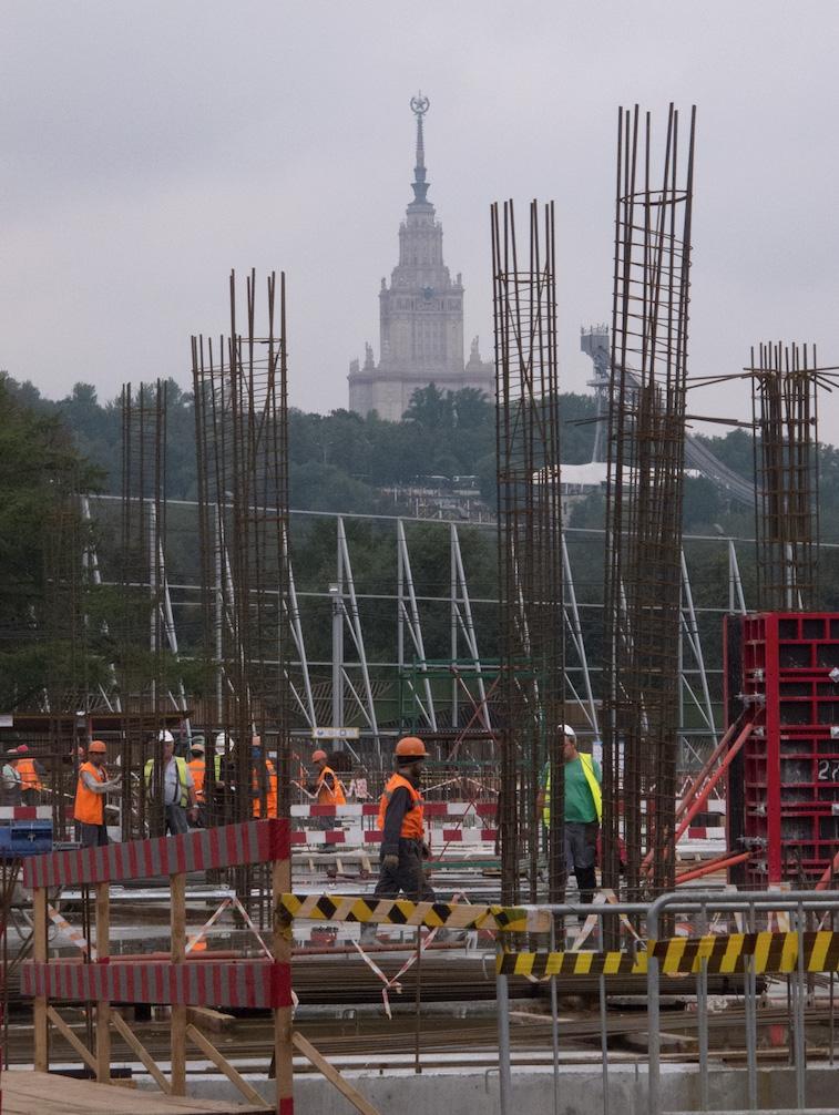 Construction workers outside Luzhniki Stadium in Moscow. 