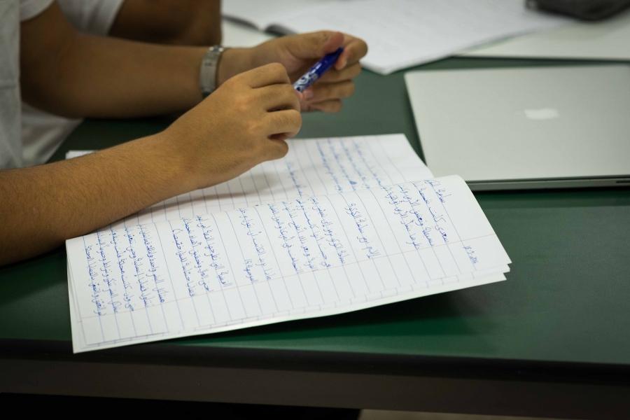 A student's notebook at an advanced Arabic class in Dubai.