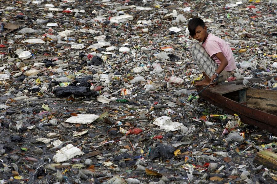 Child scavenger river plastic indonesia