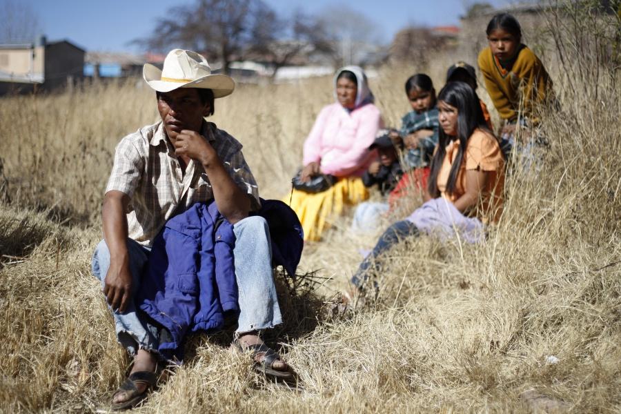  Tarahumara Indigenous family sits together in Guachochi November 30, 2011. 