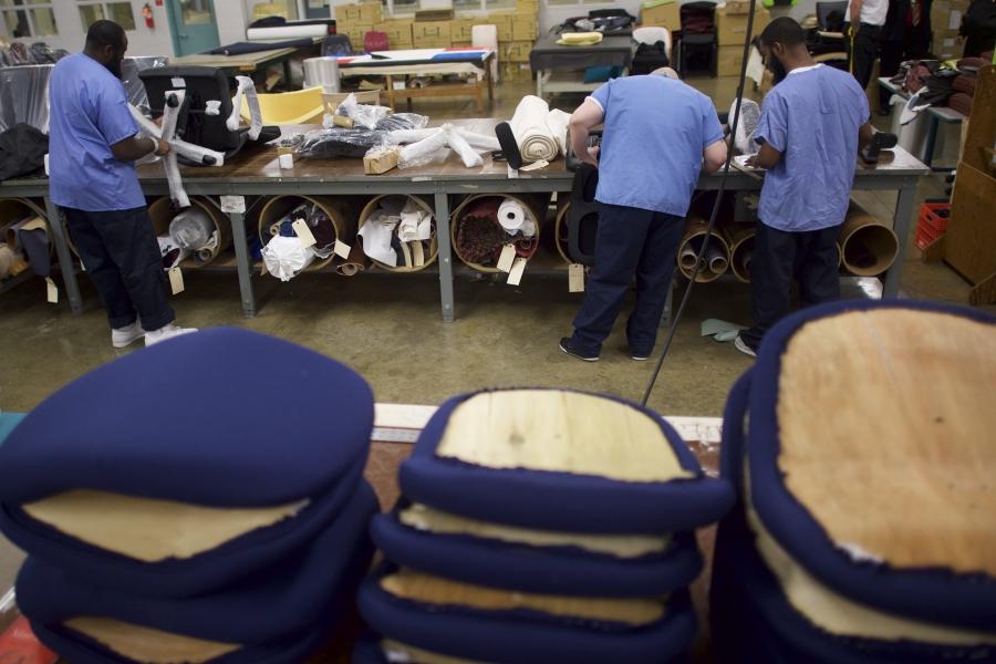 Inmates work in the furniture shop during a media tour of the Curran-Fromhold Correctional Facility in Philadelphia, Pennsylvania, August 7, 2015.