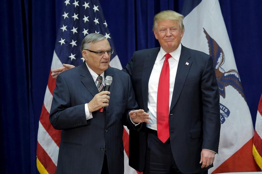 Donald Trump and Joe Arpaio appear together at a campaign rally in Marshalltown, Iowa, Jan. 26, 2016, after Arpaio endorsed Trump for president. 