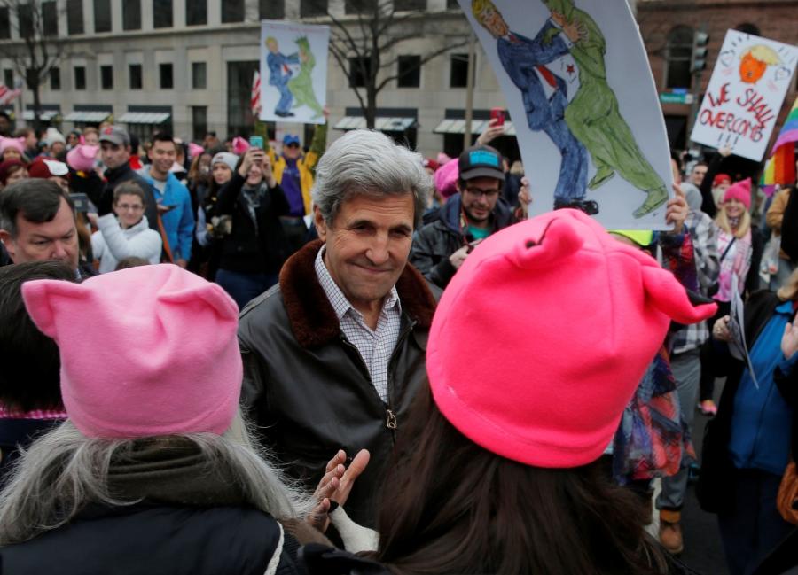 Former U.S. Secretary of State John Kerry walks to join the Women's March