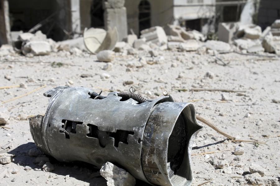 A barrel that activists said was thrown from warplanes loyal to President Bashar al-Assad in the Ariha countryside, on September 7, 2013. 