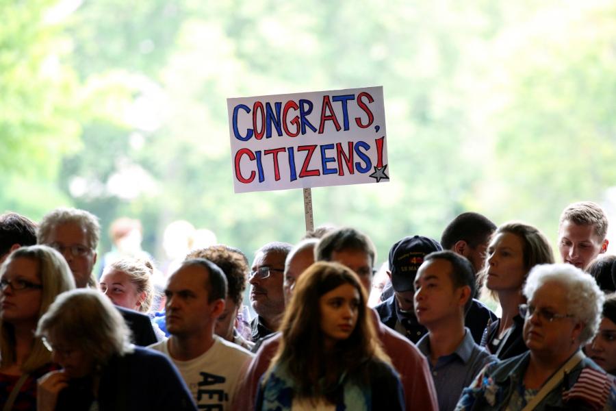Family members and other spectators listen during an Independence Day naturalization ceremony held by U.S. Citizenship and Immigration Services for 503 people at Seattle Center in Seattle, Washington July 4, 2016.