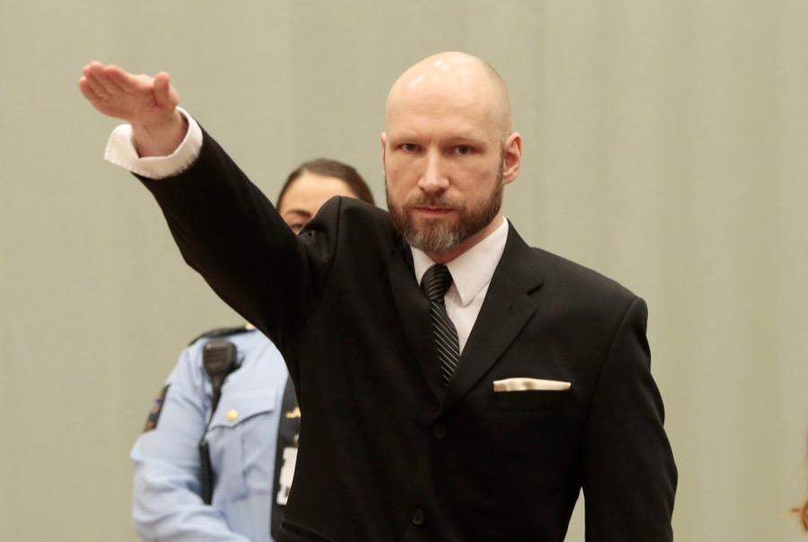 Anders Breivik raises his right hand during the appeal case in Borgarting Court of Appeal at Telemark prison in Skien, Norway
