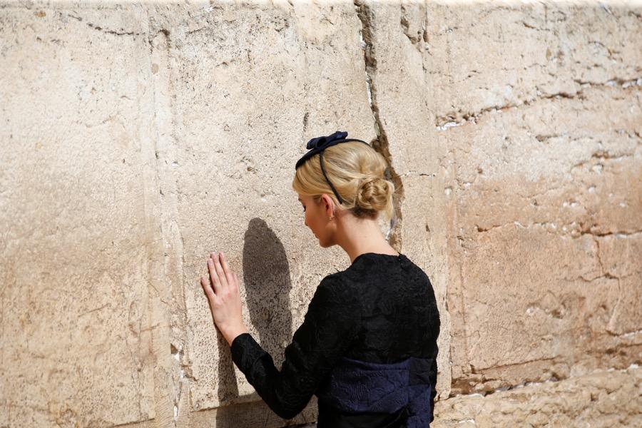 The president's daughter Ivanka Trump touches the Western Wall on May 22.
