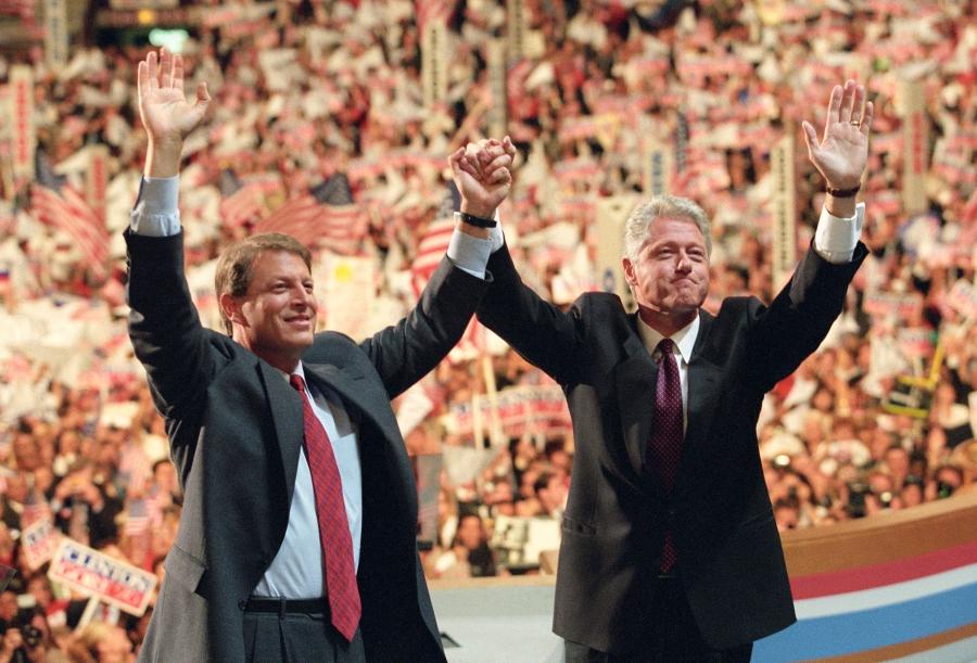 Al Gore and Bill Clinton in convention hall waving