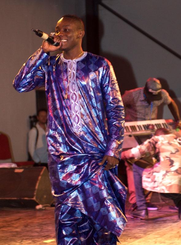 Sidiki Diabaté is a huge pop star — “more popular than me!” says his father and festival organizer Toumani. Sidiki headlined a 4,000-seat sports center packed with teenagers swooning and screaming for his pop rap. When he hit the stage at around 3 am, the