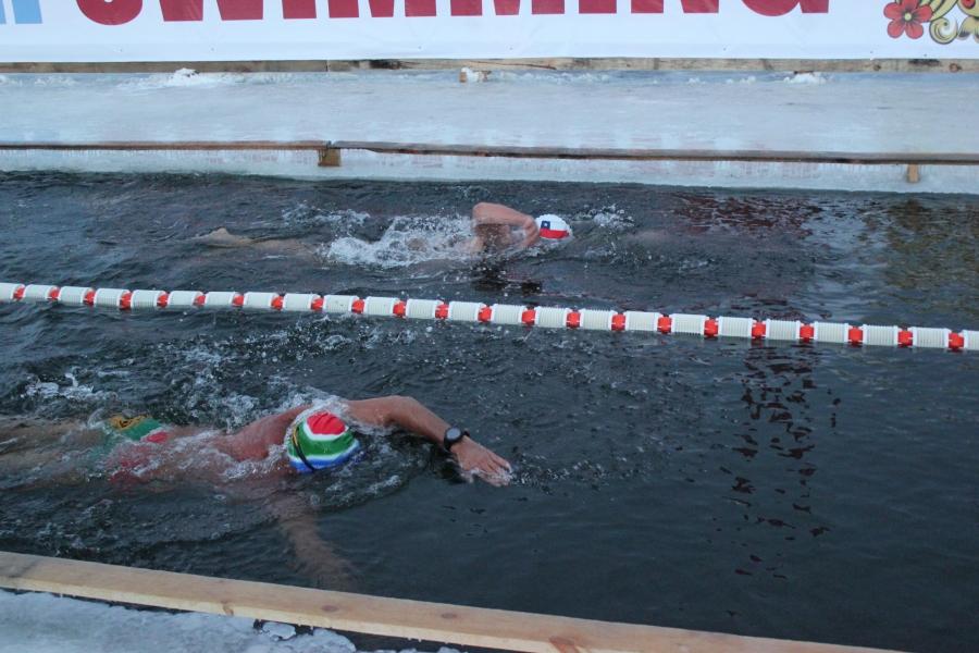 Swimming in a pool cut out of ice in Murmansk, Russia. No wet suits here.