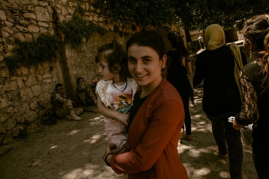 Under the protection of Kurdish peshmerga soldiers, a shrine in Lalish is safe enough for Yazidi women to revisit.