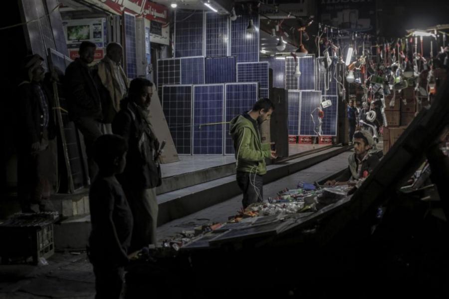 The electric grid in Sanaa, Yemen’s capital city, has been dead for months. As a result, Yemenis have become experts in wattage. Here, solar panels are sold at the market. For those that can afford them, they’ll help with the lights. But they won’t power 