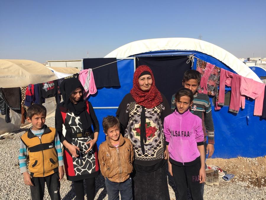Zikra Younis and her children at the Khazer camp, east of Mosul. 