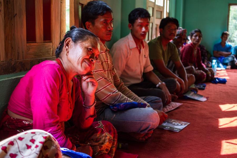 Residents of Ichok listen to a micro-enterprise training at Partnership Nepal in Sindhupalchok.