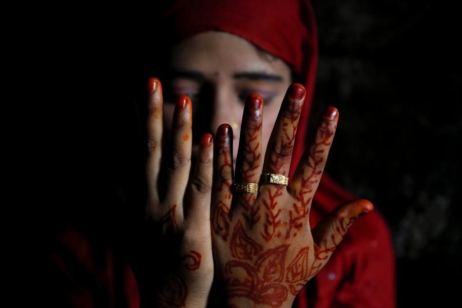 Shofika Begum shows decoration on her hands