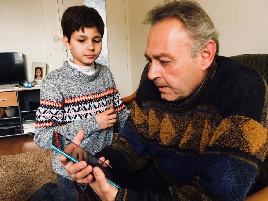 Mahmoud al-Hayek and his son Assad in their apartment in Saint-Nazaire, where they were placed by the EU’s relocation program for refugees. The family is originally from Aleppo, Syria.