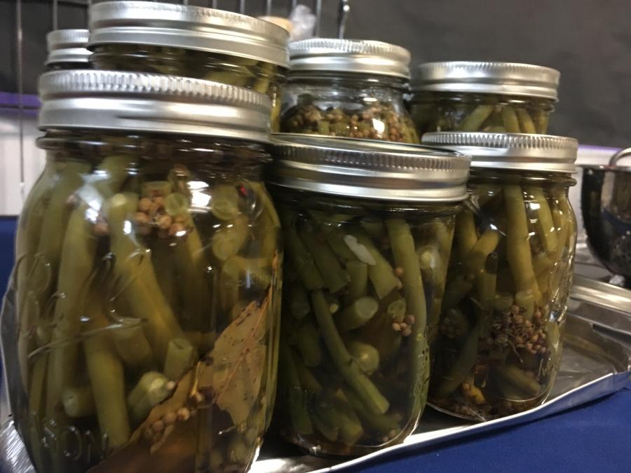 Green beans packed in glass jars