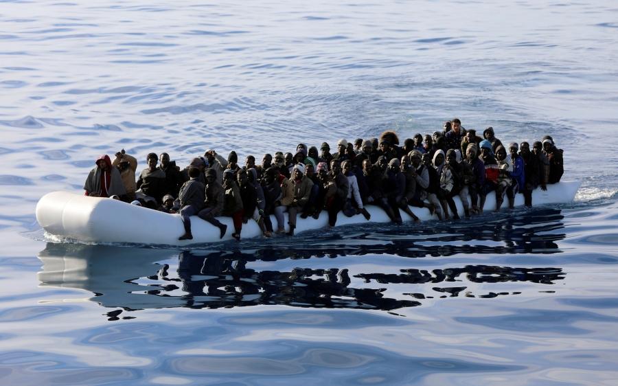 Migrants in a rubber dinghy are rescued by Libyan coast guards in the Mediterranean Sea off the coast of Libya, Jan. 15, 2018. Stories of rape along the migrant route through Libya are so common that many women who traveled it reported bringing contracept