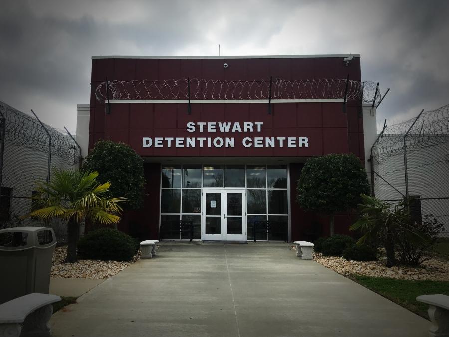 the outside of Stewart Detention Center in the pine woods of southwest Georgia.