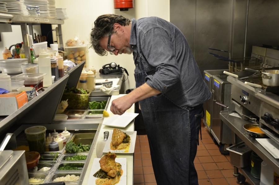 Owner and chef Jody Morphis serves up Southern-raised catfish topped with Creole sauce at his restaurant, Blue Denim in Greensboro, North Carolina. Morphis only serves domestic catfish to promote freshness. 