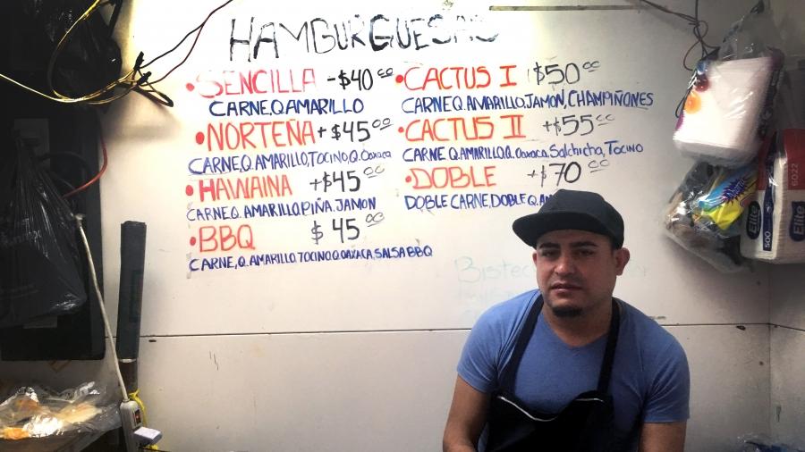 Alex Valdez, 34 at a hamburger stand 
