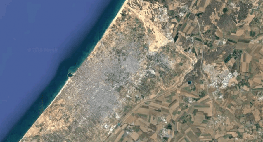 Gaza City on one side of the border, Israeli farms on the other.
