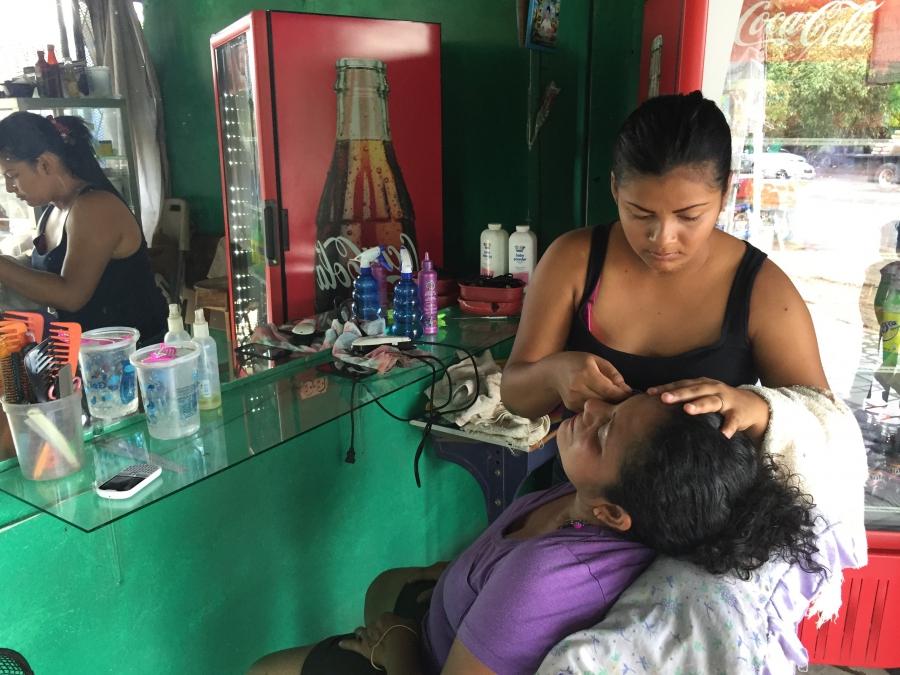 Franci Machado, 26, works at a sidewalk beauty shop in Managua. Doctors refused to give her chemotherapy because it could kill her fetus, and that would violate Nicaragua's strict abortions law.