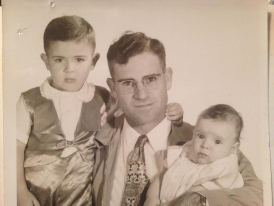 Passport photo of Lloyd Campbell and his sons John (L-wearing satin) and George (R). 